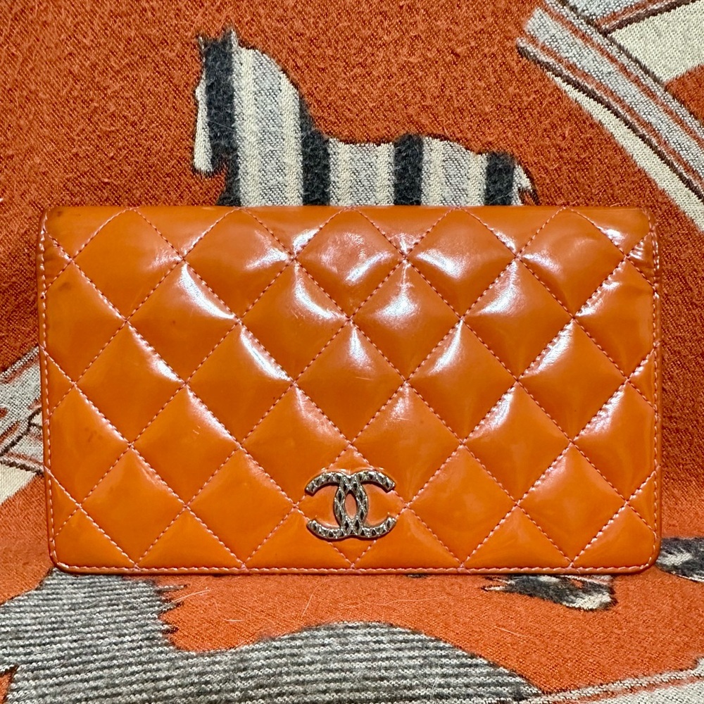 CHANEL Orange Quilted Wallet with Iconic Logo